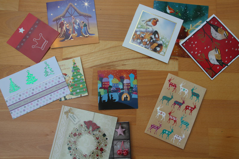 Sets of Christmas cards with five robins/five crowns