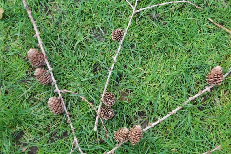 three cones on each of three sticks